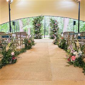 fwthumbMeadow style aisle with broken arch marquee wedding Lilys Flowers.jpg